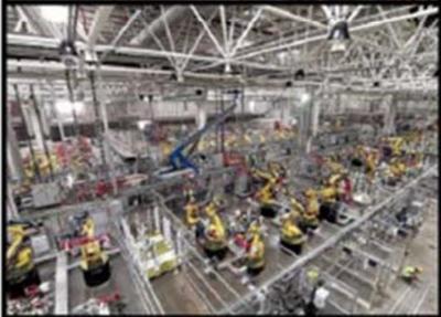 特斯拉首次披露上海工廠內(nèi)部照片:機器人已進廠并組裝完畢